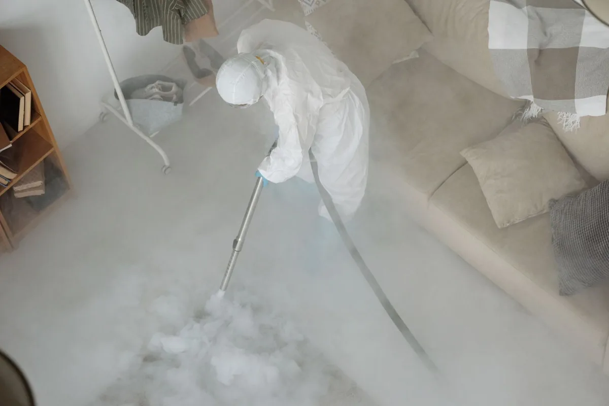 Biohazard cleanup technician in protective equipment, South Hutchinson, KS